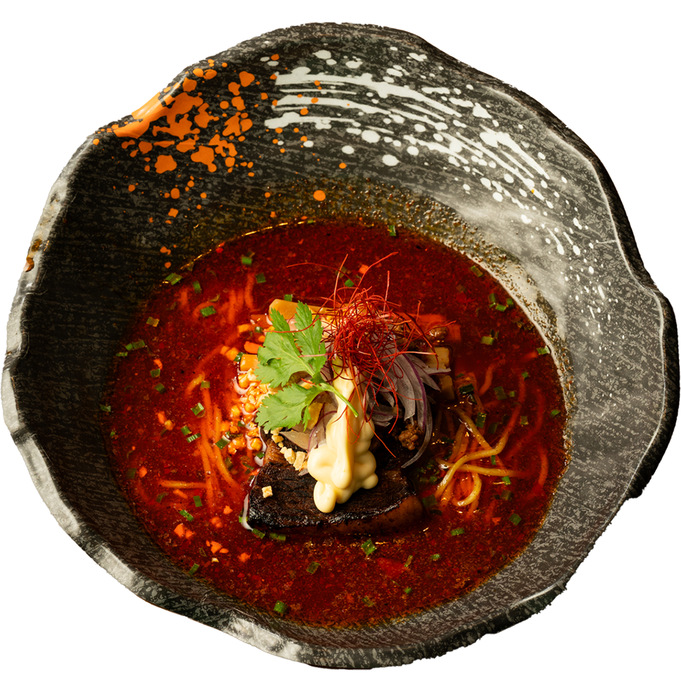 牛骨麻辣チャーシューラーメン。上野広小路から徒歩一分。濃厚な牛骨の旨味が味わえる牛骨ラーメン専門店。